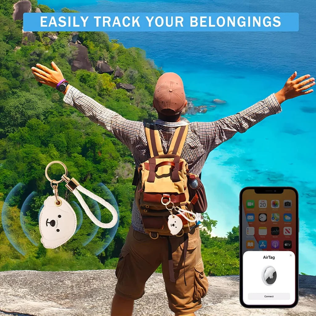 White dog-shaped AirTag leather keychain with hand straps and silver chain