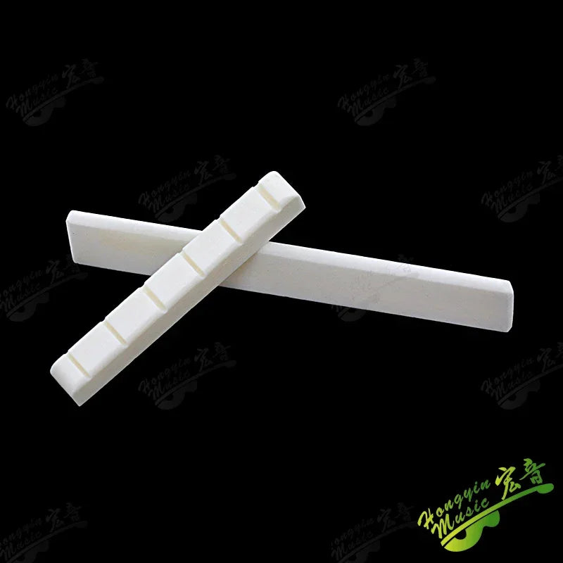Acoustic guitar  and 4 5 6 7 12String Bass guitar nut slotted, upper and lower nuts slotted in various sizes Made of Bovine bone