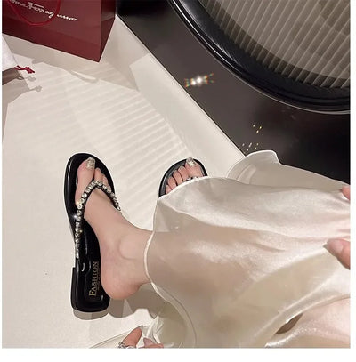 Beach flip-flops women wear high-grade summer new flat-bottomed non-slip holiday online celebrity toe sandals.