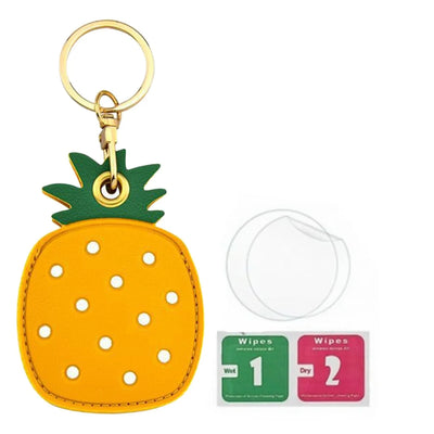 Yellow pineapple leather AirTag keychain with hand straps and green leaves