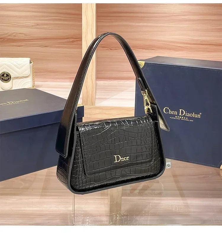 Classic women’s handbag in leather shoulder and crossbody bag style luxury elegant design for ladies by famous designer