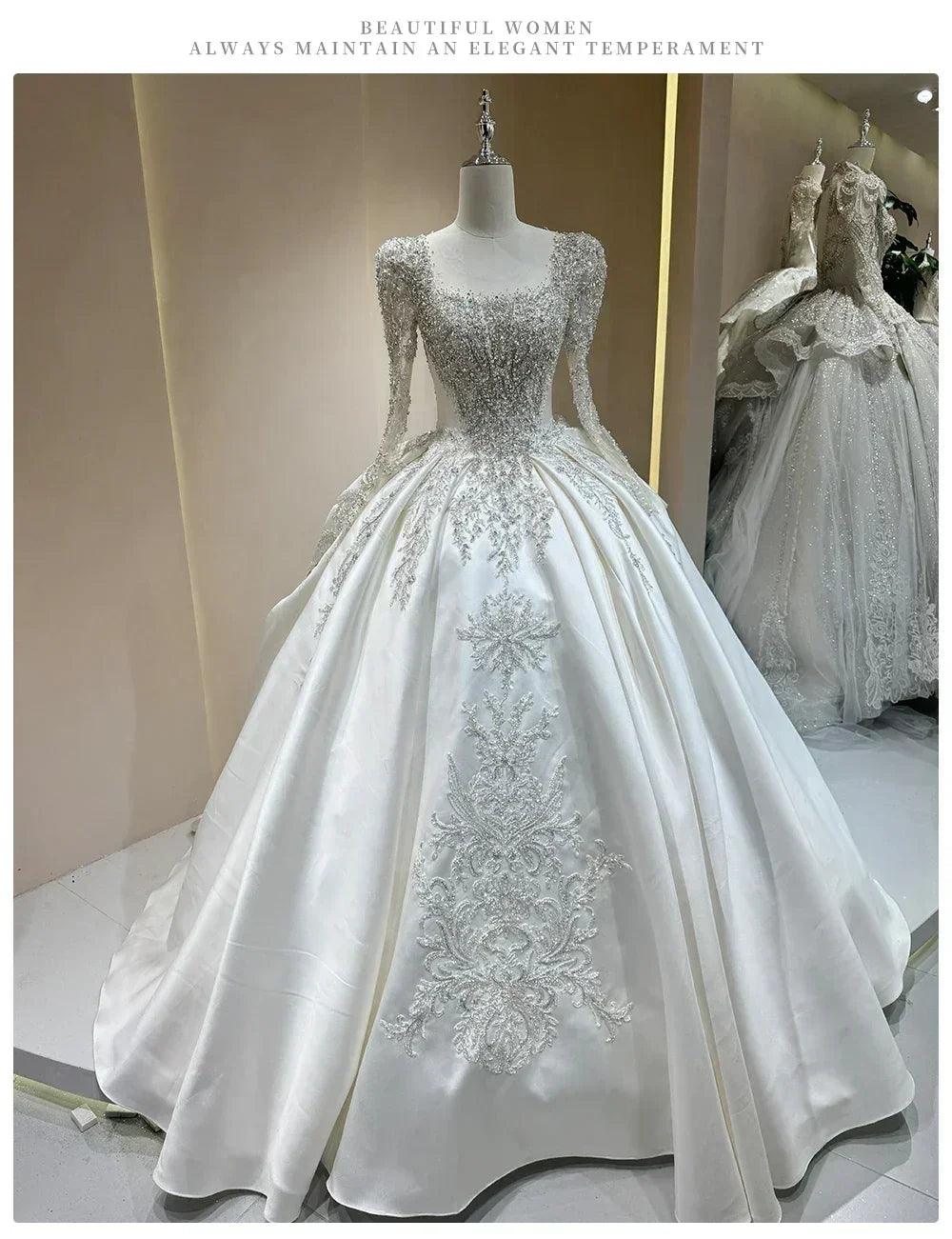 Wedding dress with sparkling embellishments and long trains delicate lace