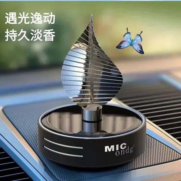 Car aromatherapy perfume car premium sense of niche rotating solar gold leaf net red new
