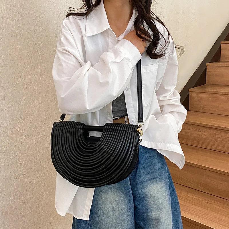 Handbags for women 2025 new gold luxury designer brand handwoven noodle bags rope knotted pulled half moon silver