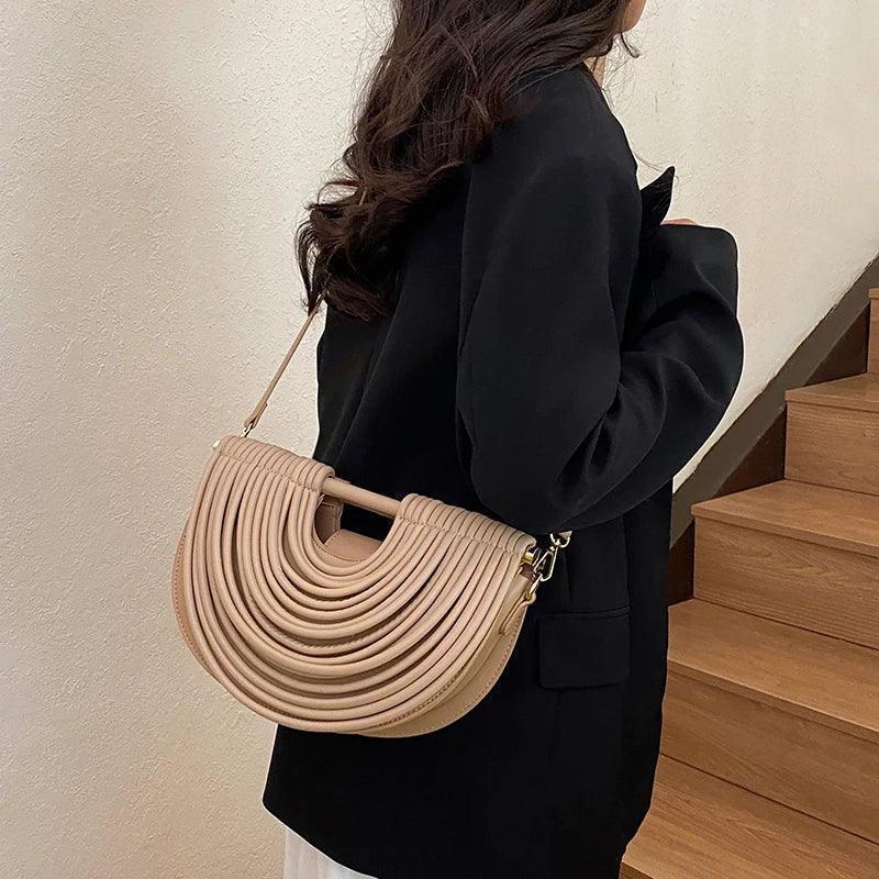 Handbags for women 2025 new gold luxury designer brand handwoven noodle bags rope knotted pulled half moon silver