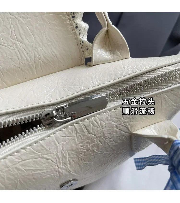 2025 new designer hand carved shoulder bag stylish textured crossbody purse for women elegant handheld tote fashionable