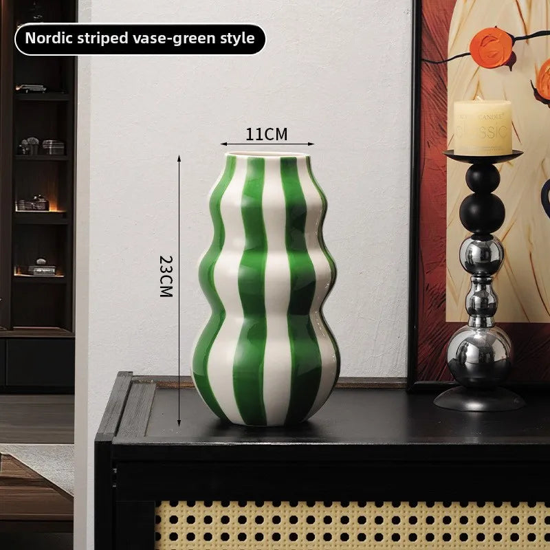 Modern niche minimalist striped vases, flower arrangements in them, high-end sense, creative retro painted ceramic vases