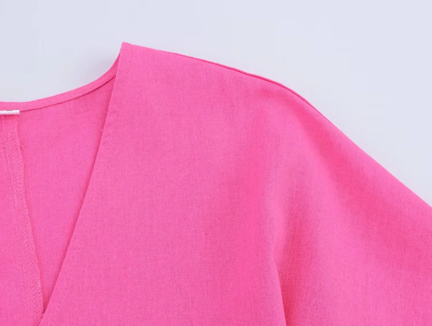 Women's asymmetrical V-neck design linen top