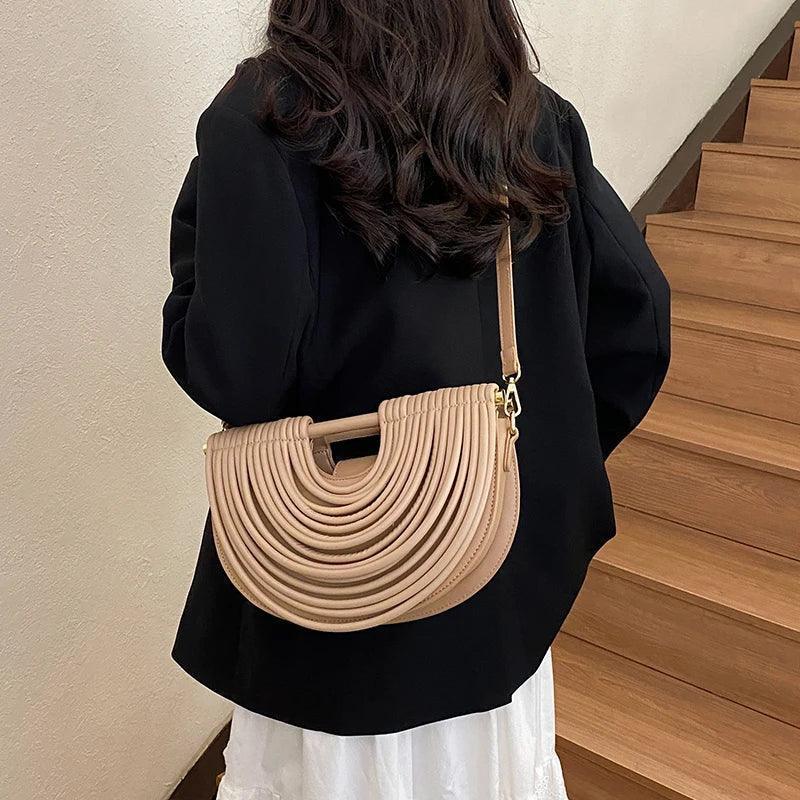 Handbags for women 2025 new gold luxury designer brand handwoven noodle bags rope knotted pulled half moon silver
