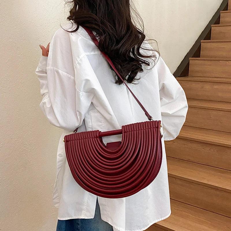 Handbags for women 2025 new gold luxury designer brand handwoven noodle bags rope knotted pulled half moon silver