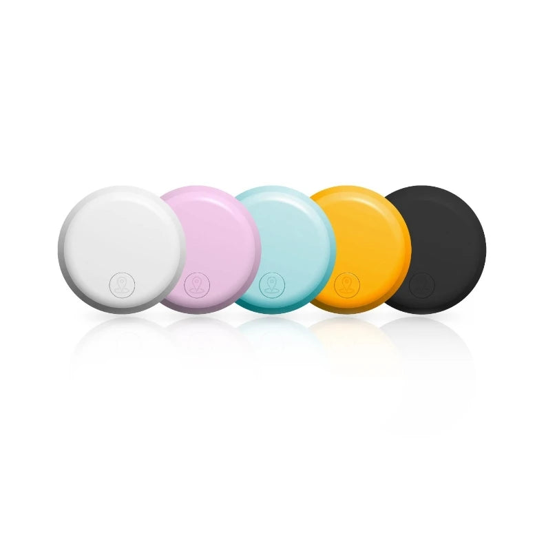 White and black round Apple AirTag smart tracker with button