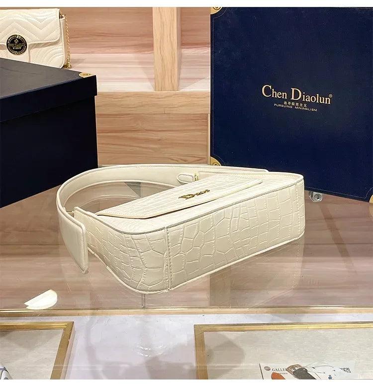 Classic women’s handbag in leather shoulder and crossbody bag style luxury elegant design for ladies by famous designer