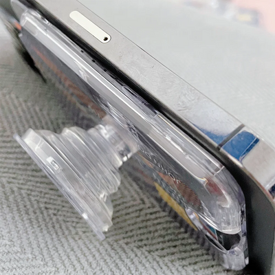 Silver laptop with clear plastic cover in Magnetic Airbag iPhone card case