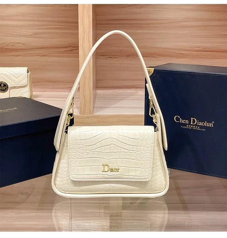 Classic women’s handbag in leather shoulder and crossbody bag style luxury elegant design for ladies by famous designer