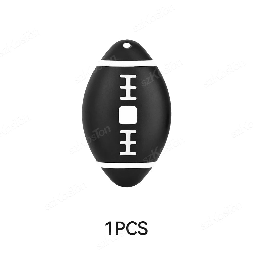 Black football keychain iTag with white stripes, Find My compatible tracker
