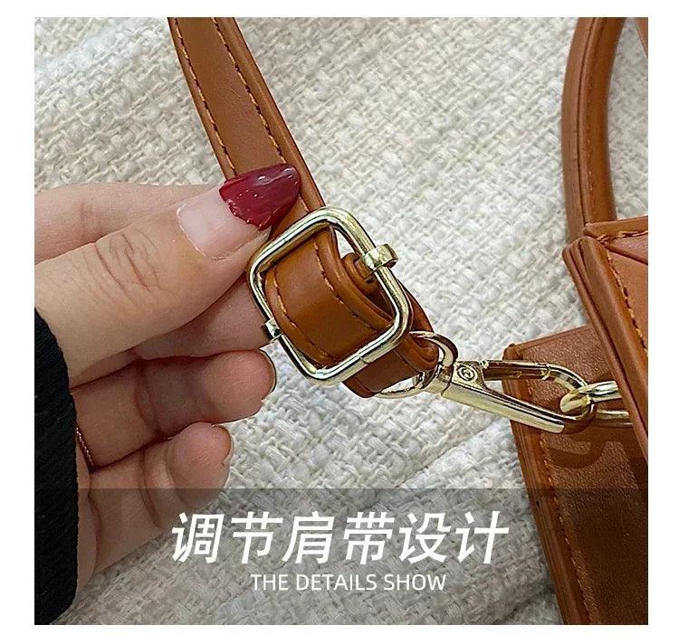 Elegant classic designer paris fashion inspired handbag for women with minimalist vintage charm and logo