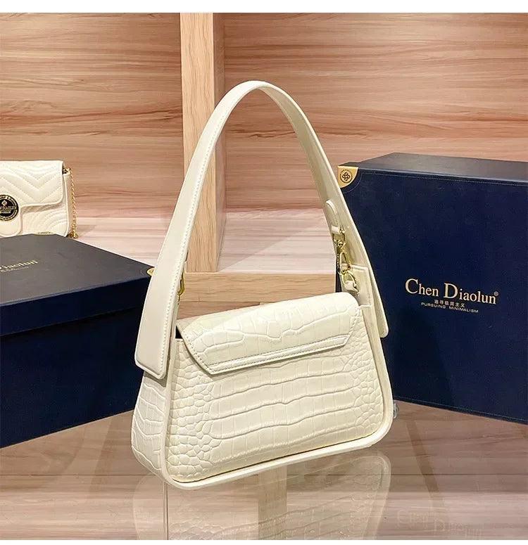 Classic women’s handbag in leather shoulder and crossbody bag style luxury elegant design for ladies by famous designer