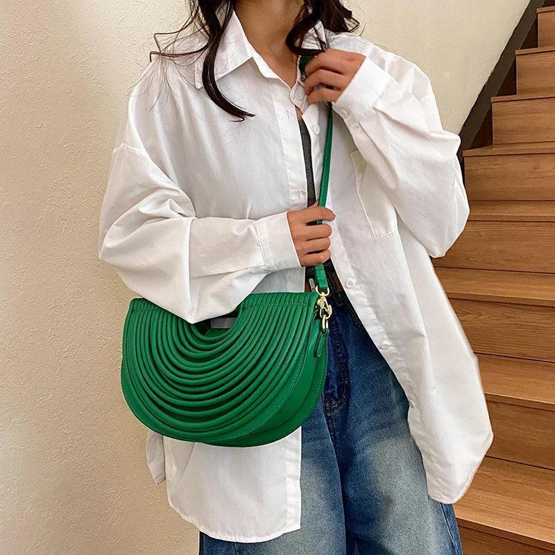 Handbags for women 2025 new gold luxury designer brand handwoven noodle bags rope knotted pulled half moon silver