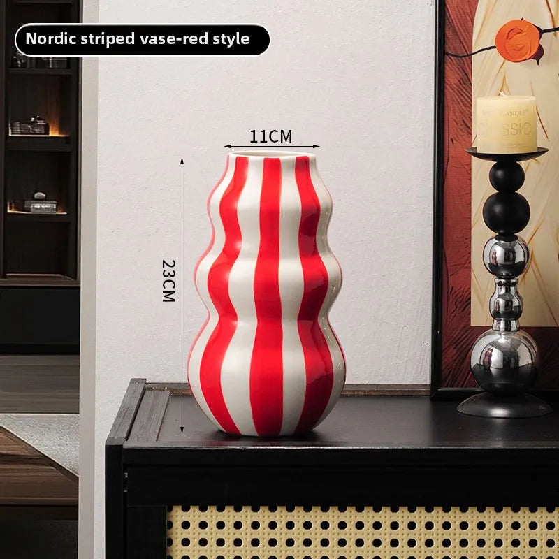 Modern niche minimalist striped vases, flower arrangements in them, high-end sense, creative retro painted ceramic vases