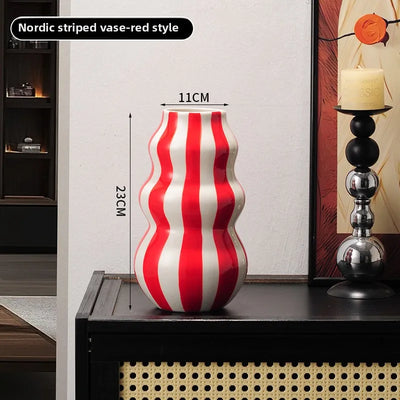Modern niche minimalist striped vases, flower arrangements in them, high-end sense, creative retro painted ceramic vases