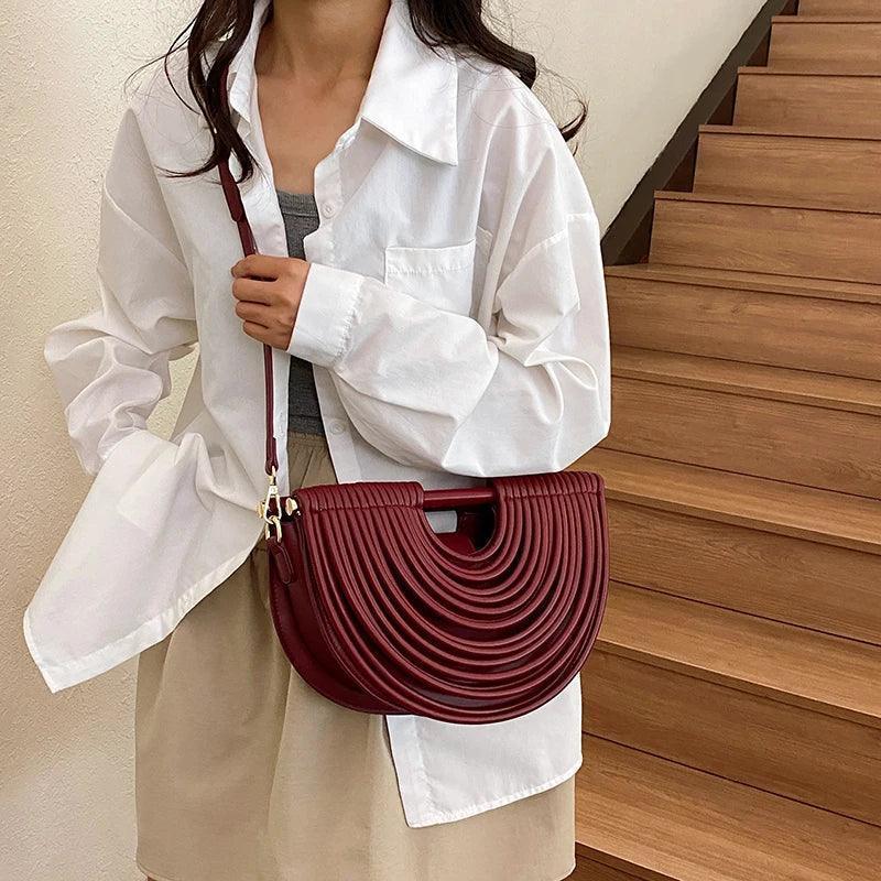 Handbags for women 2025 new gold luxury designer brand handwoven noodle bags rope knotted pulled half moon silver