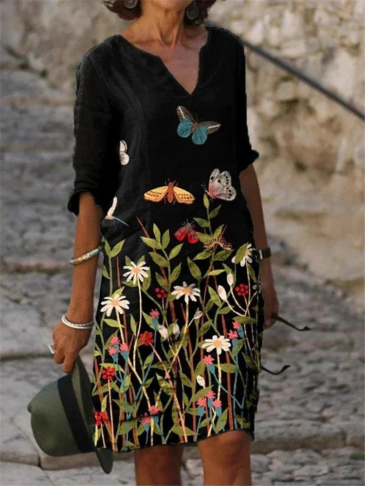 Vestido feminino de algodão com estampa floral colorida.