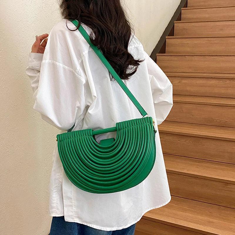 Handbags for women 2025 new gold luxury designer brand handwoven noodle bags rope knotted pulled half moon silver