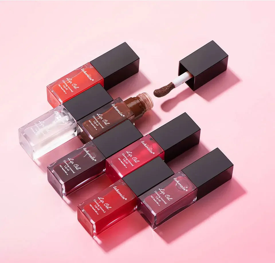 Glow Reviver Lip Oil Nourishing Tinted Lip Oil For A High-shine Finish Infused With Apricot Oil Rose Colors  Mirror Moisturizing