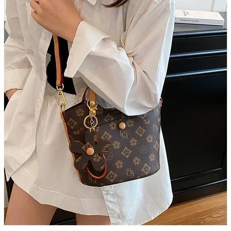 In 2025 designer retro printed handbags convertible crossbody bags and luxury textured best-selling women’s