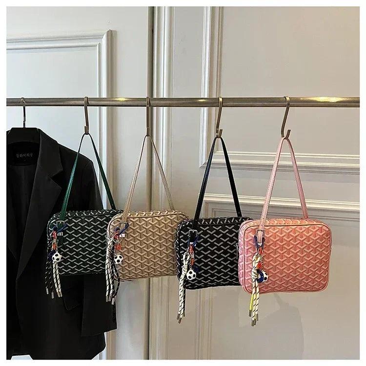 Popular leather handbags for ladies - famous designer shoulder bag with classic messenger features