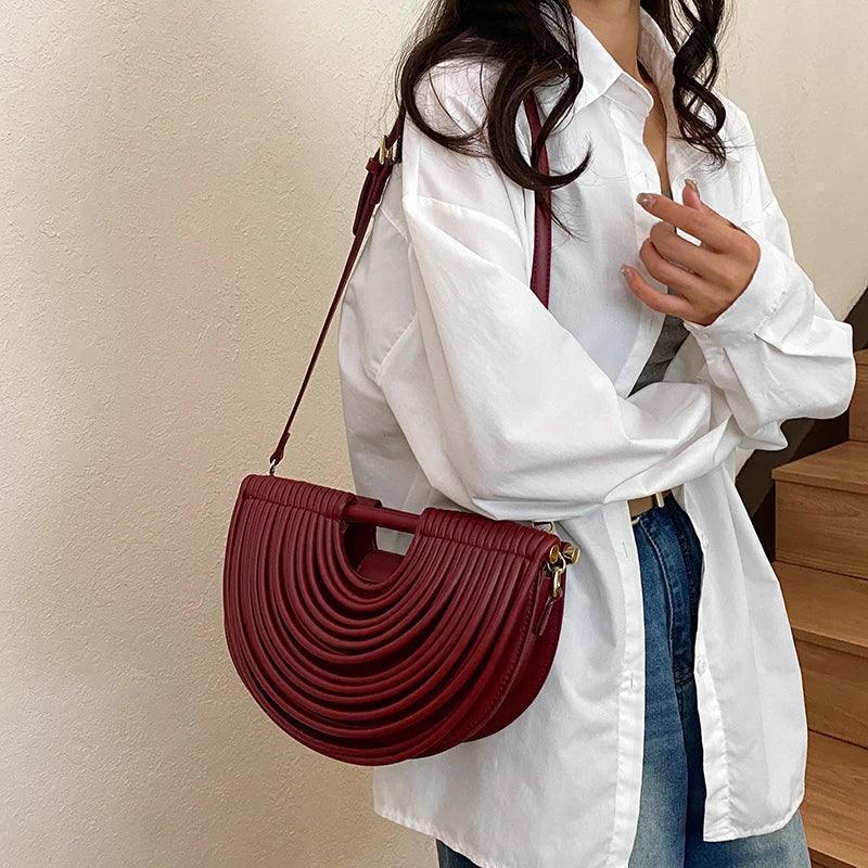 Handbags for women 2025 new gold luxury designer brand handwoven noodle bags rope knotted pulled half moon silver