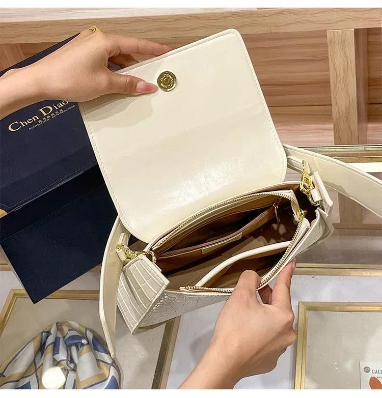 Classic women’s handbag in leather shoulder and crossbody bag style luxury elegant design for ladies by famous designer