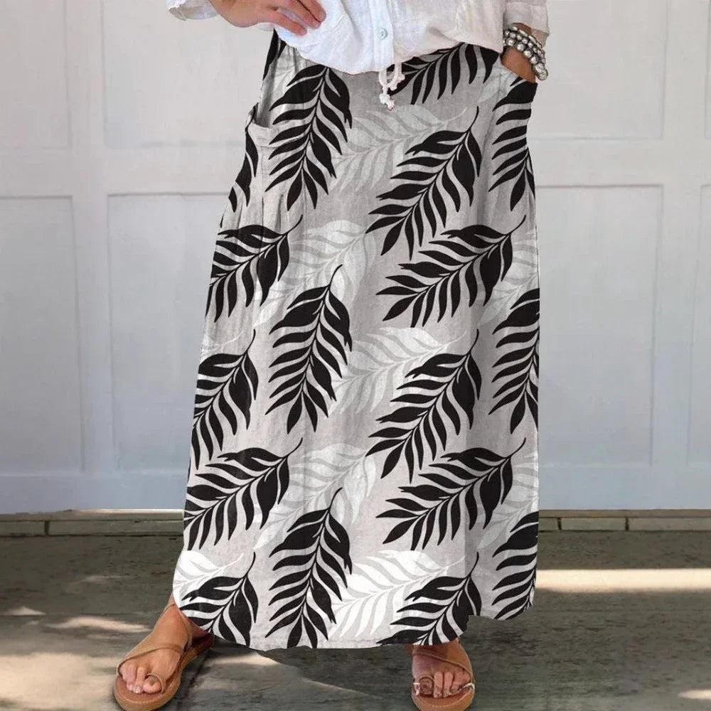 Women‘s Summer Floral Print Skirts Casual Trendy Pleated Skirts with Pockets Elastic High Waist Flowy Loose Skirts Holiday Dress