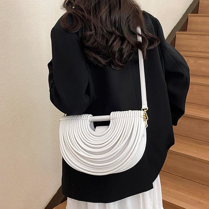 Handbags for women 2025 new gold luxury designer brand handwoven noodle bags rope knotted pulled half moon silver