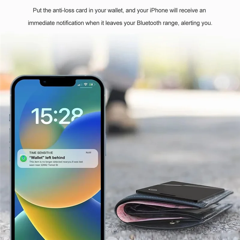 IPhone 12 black leather wallet case with pink accents and AirTag GPS tracker