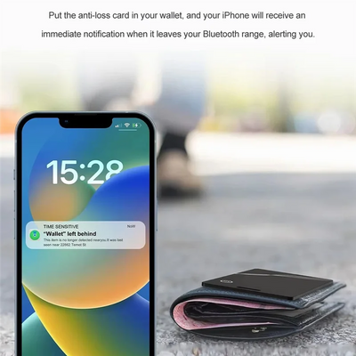 IPhone 12 black leather wallet case with pink accents and AirTag GPS tracker