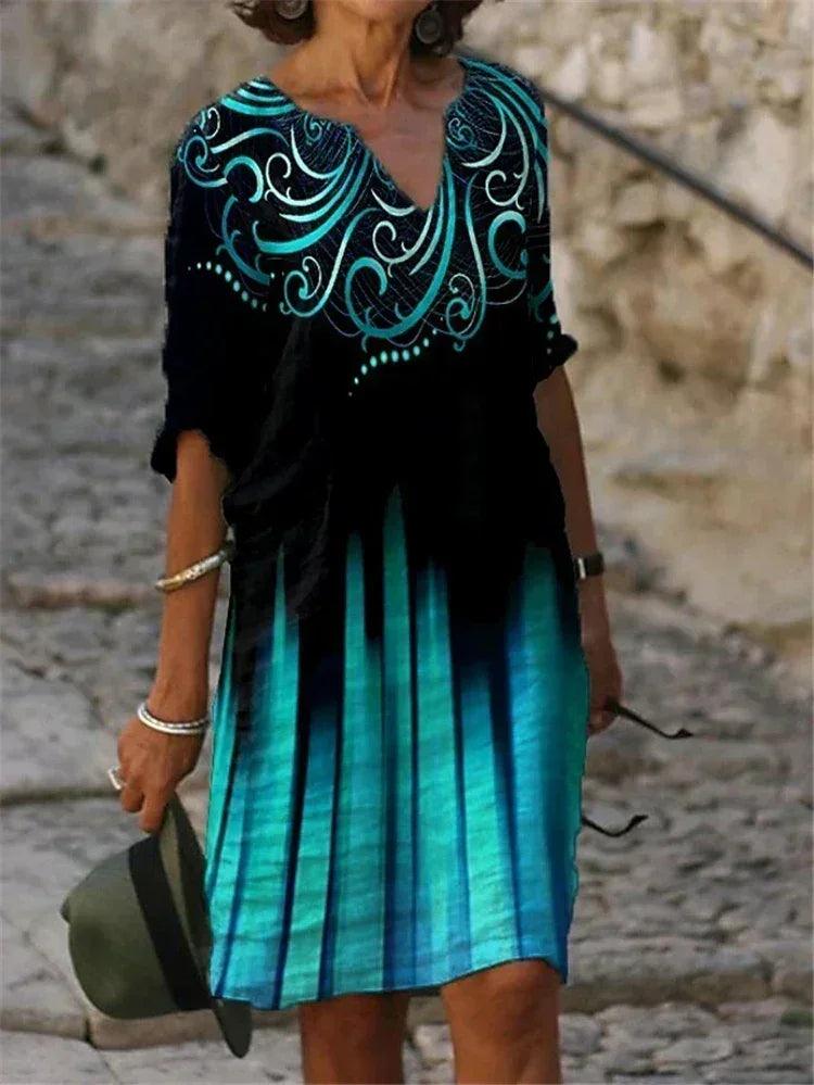 Vestido feminino de algodão com estampa floral colorida.