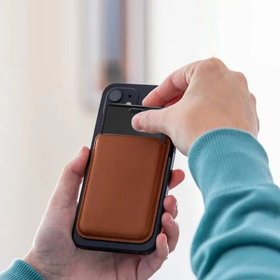 Brown leather slim wallet phone case with AirTag tracker and magnetic closure