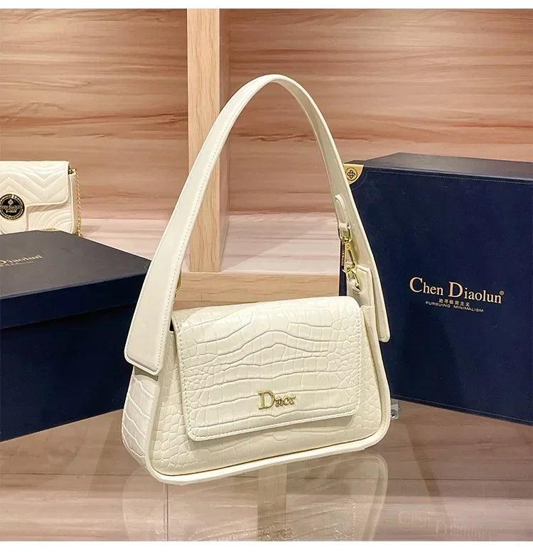 Classic women’s handbag in leather shoulder and crossbody bag style luxury elegant design for ladies by famous designer