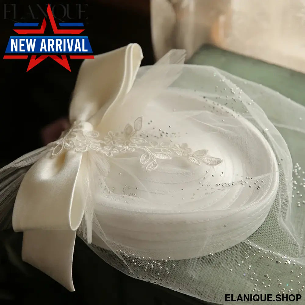 Elegant White Bridal Fascinator Hat – Lace Veil Bow Pillbox Cap