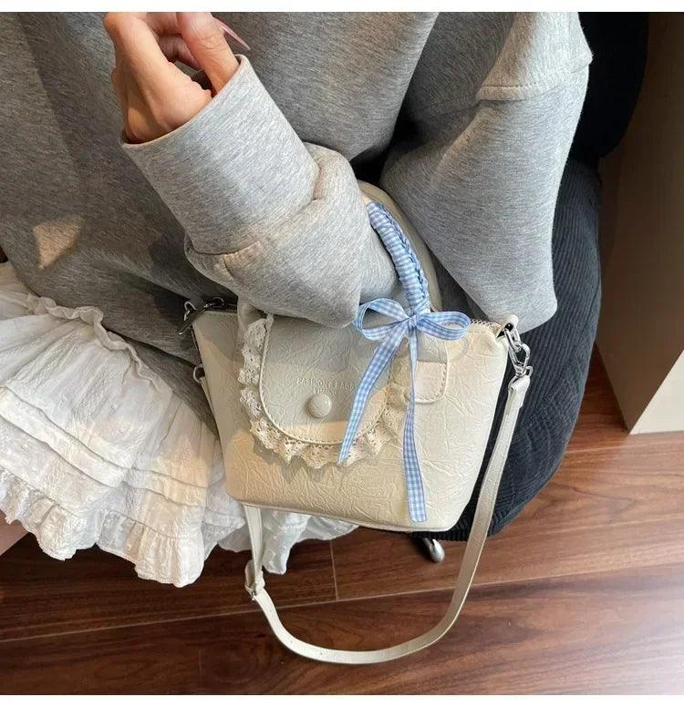 2025 new designer hand carved shoulder bag stylish textured crossbody purse for women elegant handheld tote fashionable