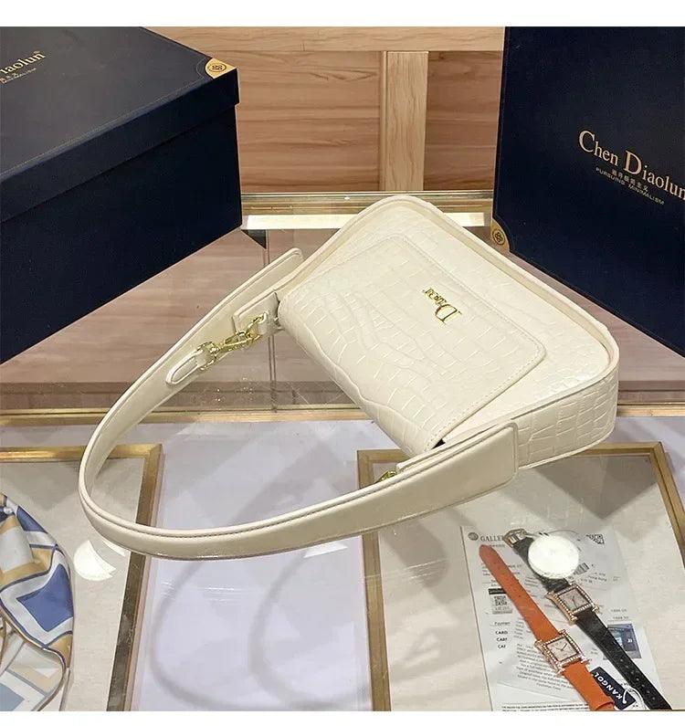 Classic women’s handbag in leather shoulder and crossbody bag style luxury elegant design for ladies by famous designer