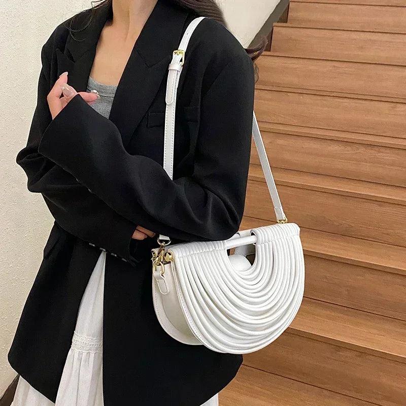 Handbags for women 2025 new gold luxury designer brand handwoven noodle bags rope knotted pulled half moon silver