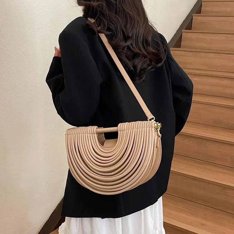 Handbags for women 2025 new gold luxury designer brand handwoven noodle bags rope knotted pulled half moon silver