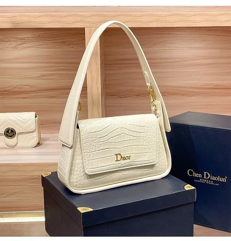 Classic women’s handbag in leather shoulder and crossbody bag style luxury elegant design for ladies by famous designer