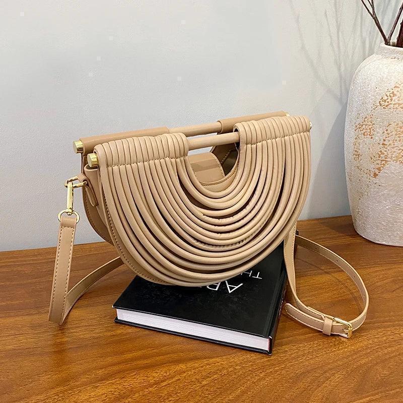 Handbags for women 2025 new gold luxury designer brand handwoven noodle bags rope knotted pulled half moon silver