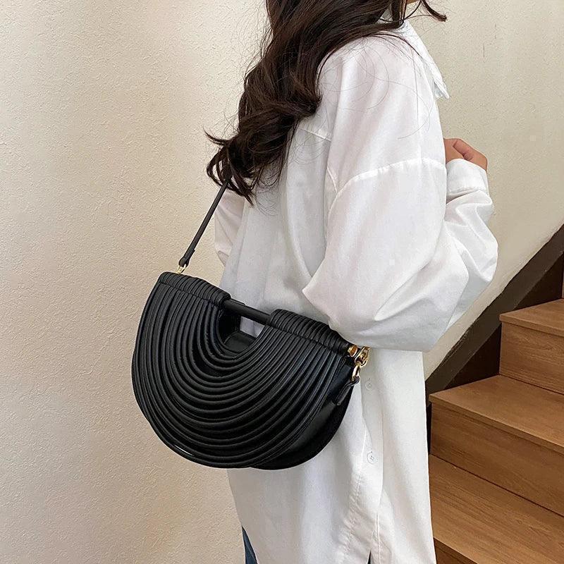 Handbags for women 2025 new gold luxury designer brand handwoven noodle bags rope knotted pulled half moon silver