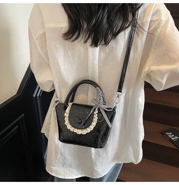 2025 new designer hand carved shoulder bag stylish textured crossbody purse for women elegant handheld tote fashionable